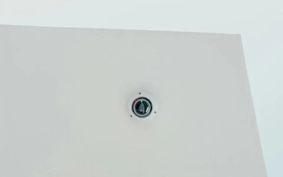 Dome security camera on a ceiling