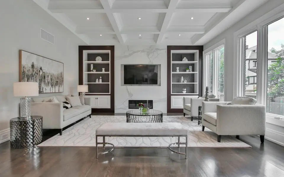 Contemporary living room with a marble feature wall